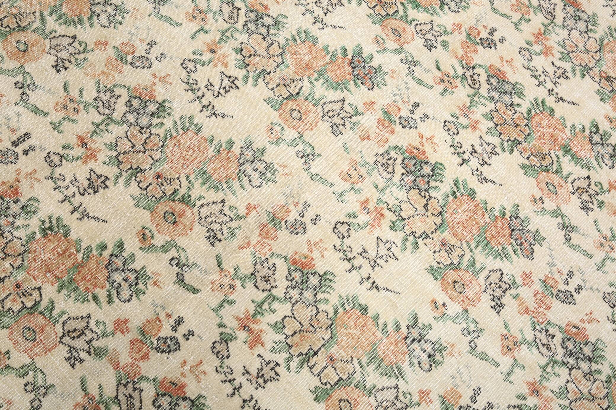 Tapis en laine et coton à décor floral