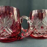 Pair of cut and red tinted crystal beer mugs signed Etzel