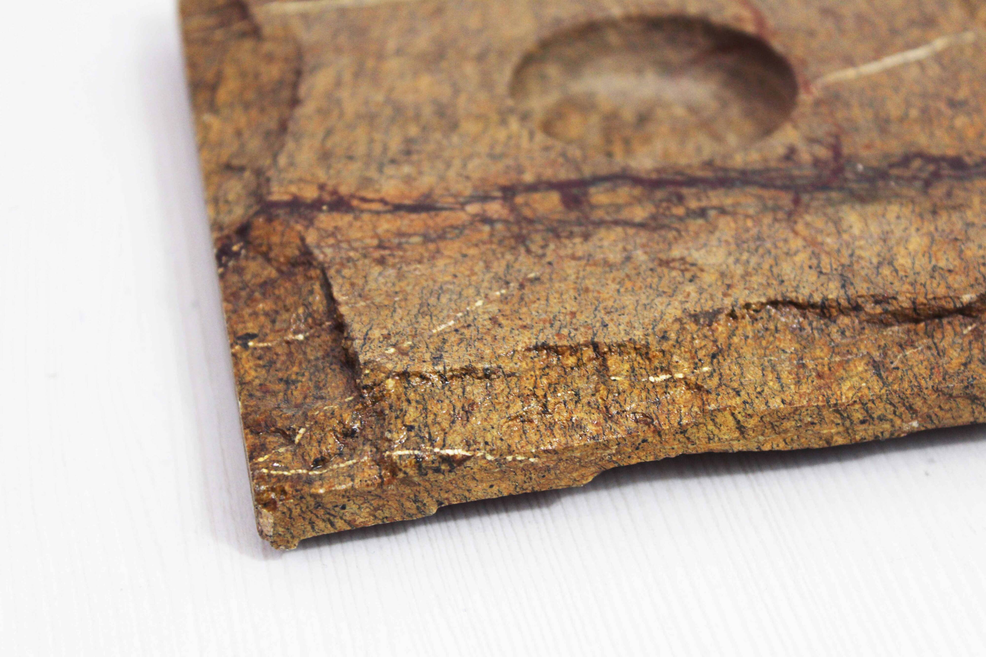 Pair of travertine candlesticks