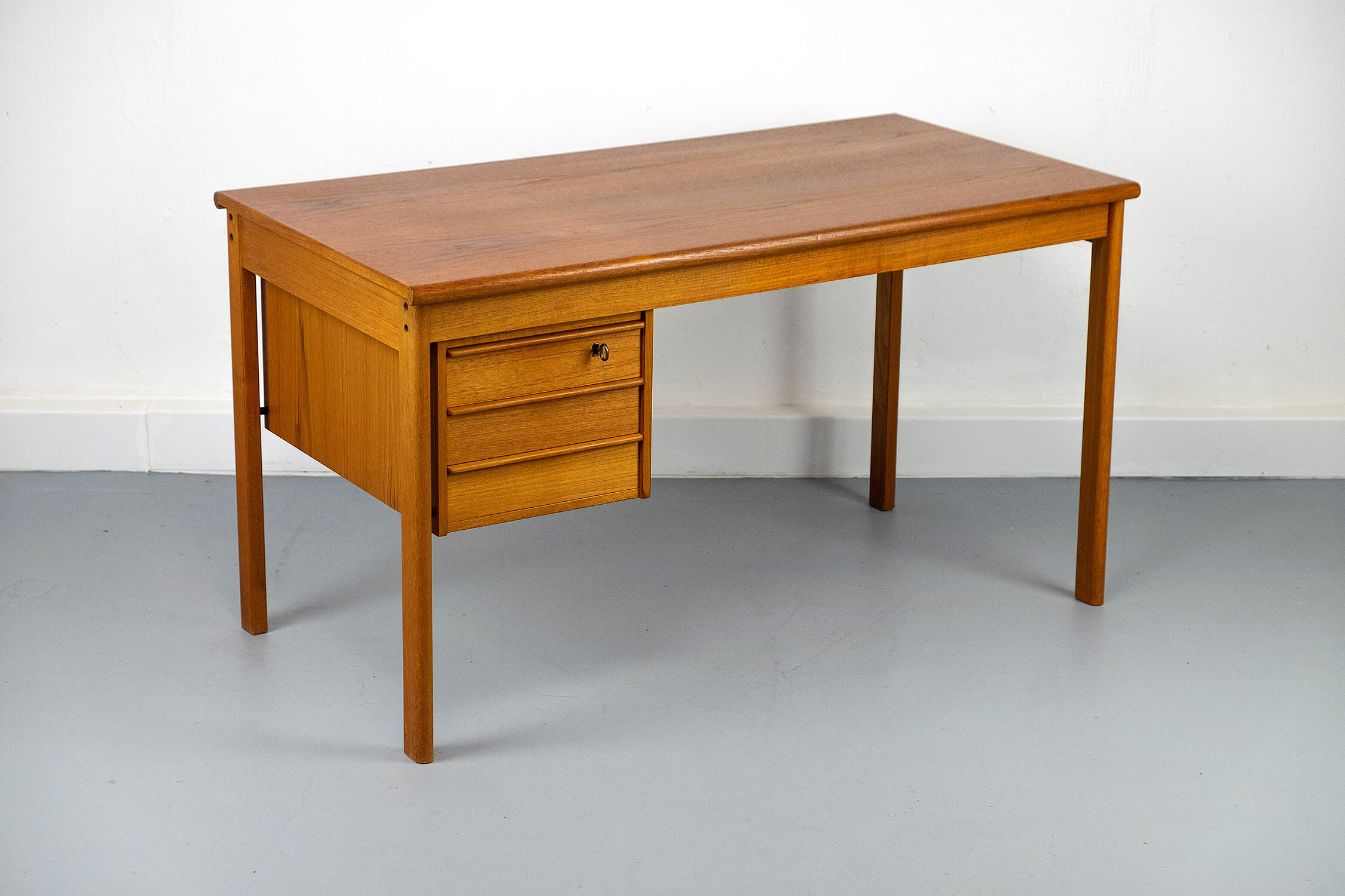 Teak Desk with movable table top by Løvig, 1960s