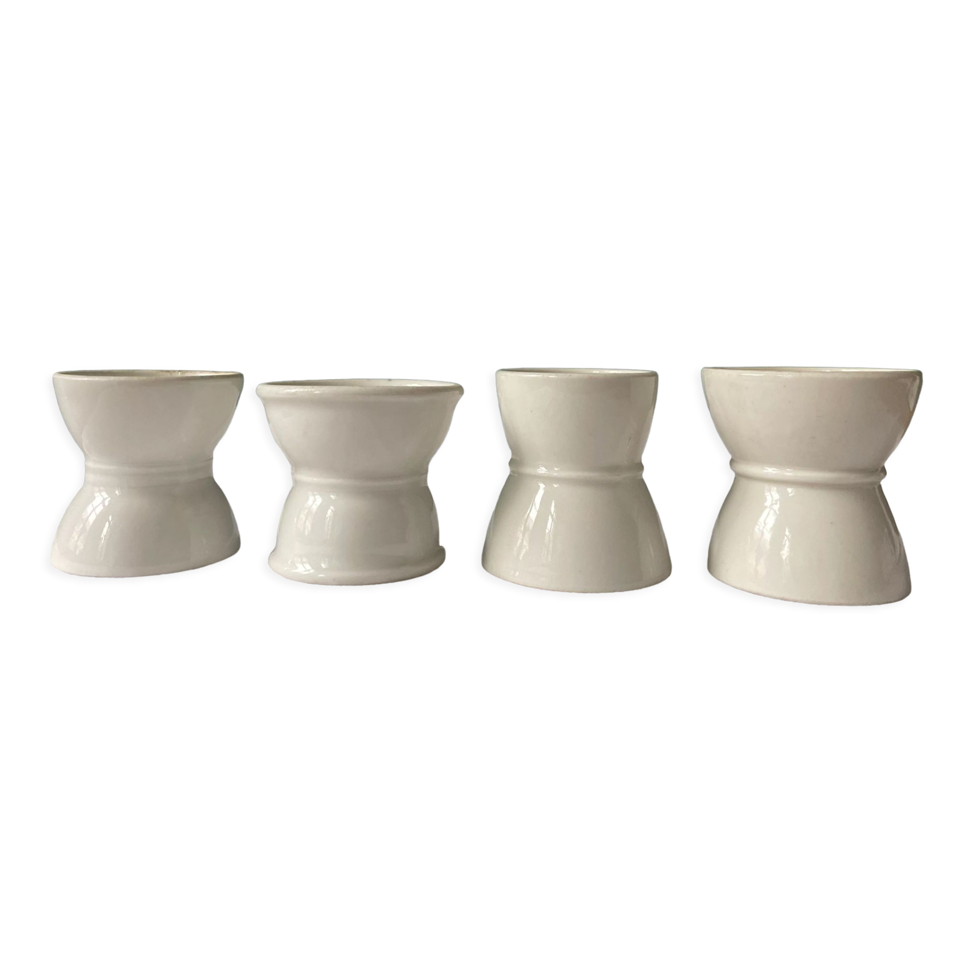 Set of 4 white porcelain diabolo shells
