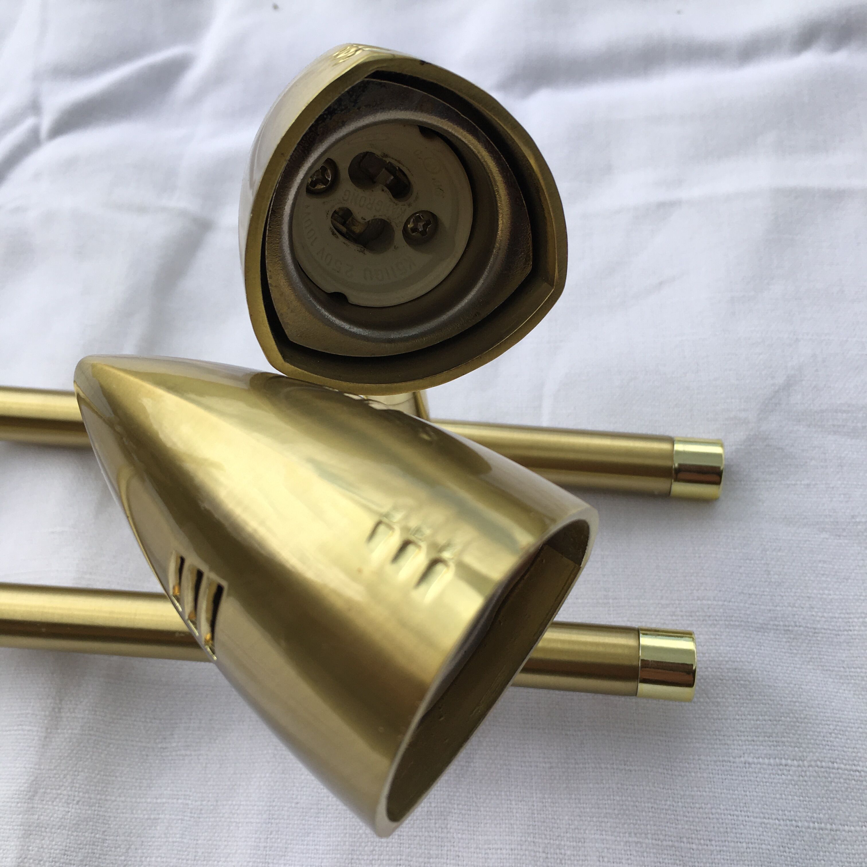 Pair of gold brass design sconces