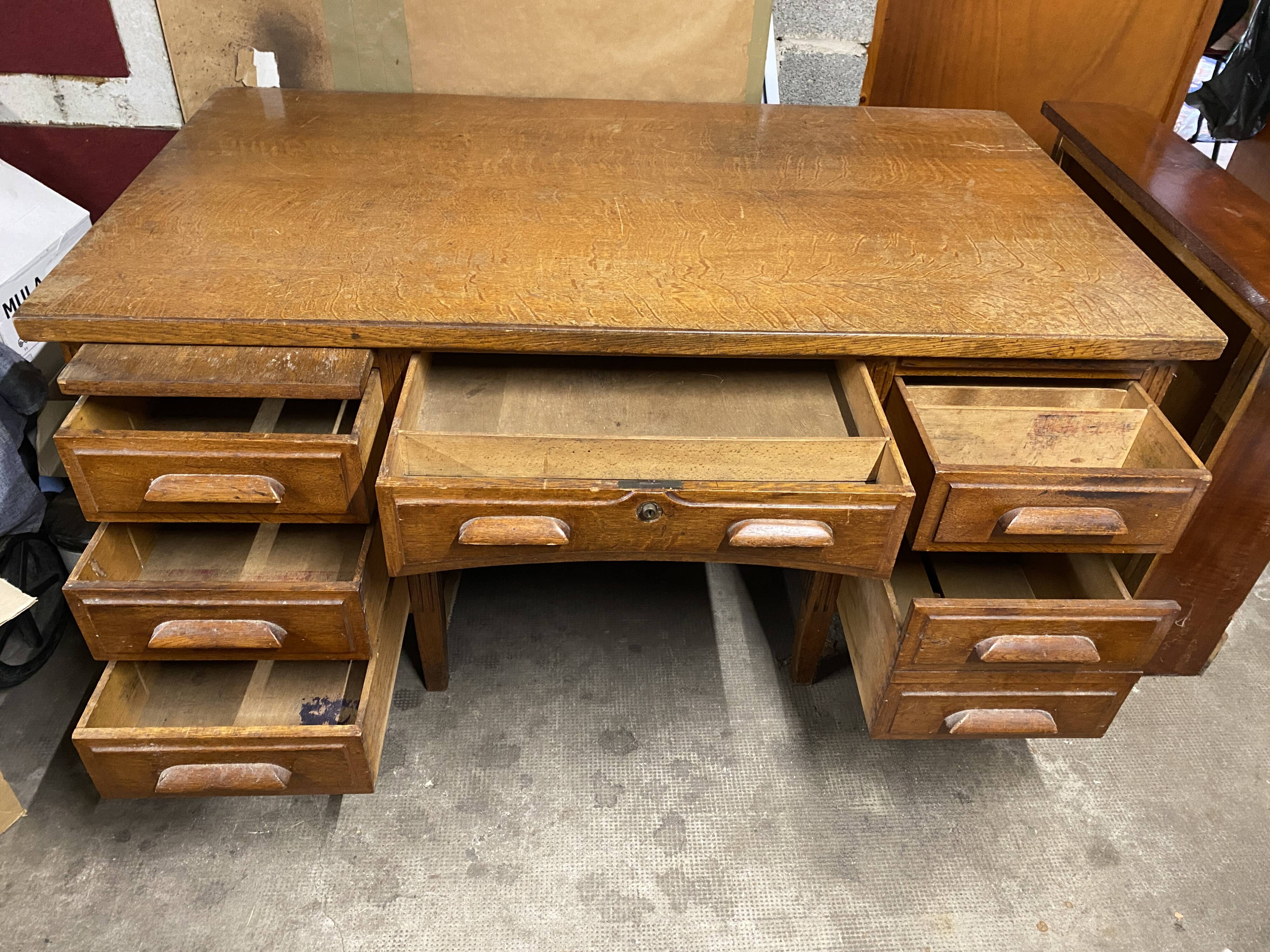 Teacher's desk from the 1950s on legs.