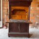 Large secretary with a drop-down front, Restoration style in flamed mahogany and marble.