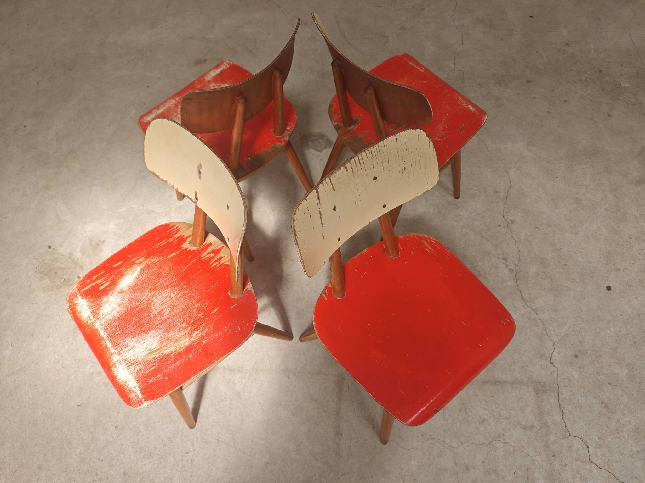 Set of 4 Ton (Thonet) red wooden chairs from the 1960s.
