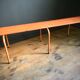 Ancien banc métallique orange