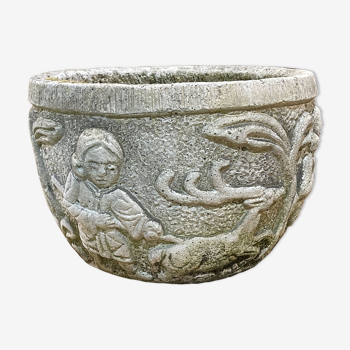Reconstituted stone planter with hunting decoration