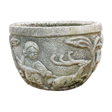 Reconstituted stone planter with hunting decoration