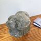 Stone sculpture of a man