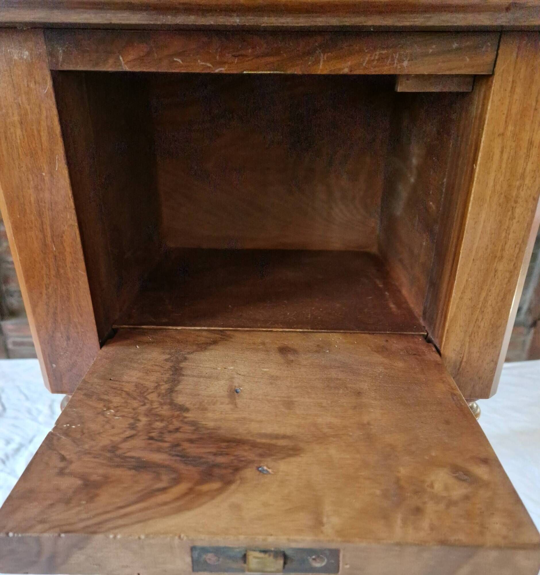 Nineteenth-century walnut work table with flaps, large storage + secret drawer.
