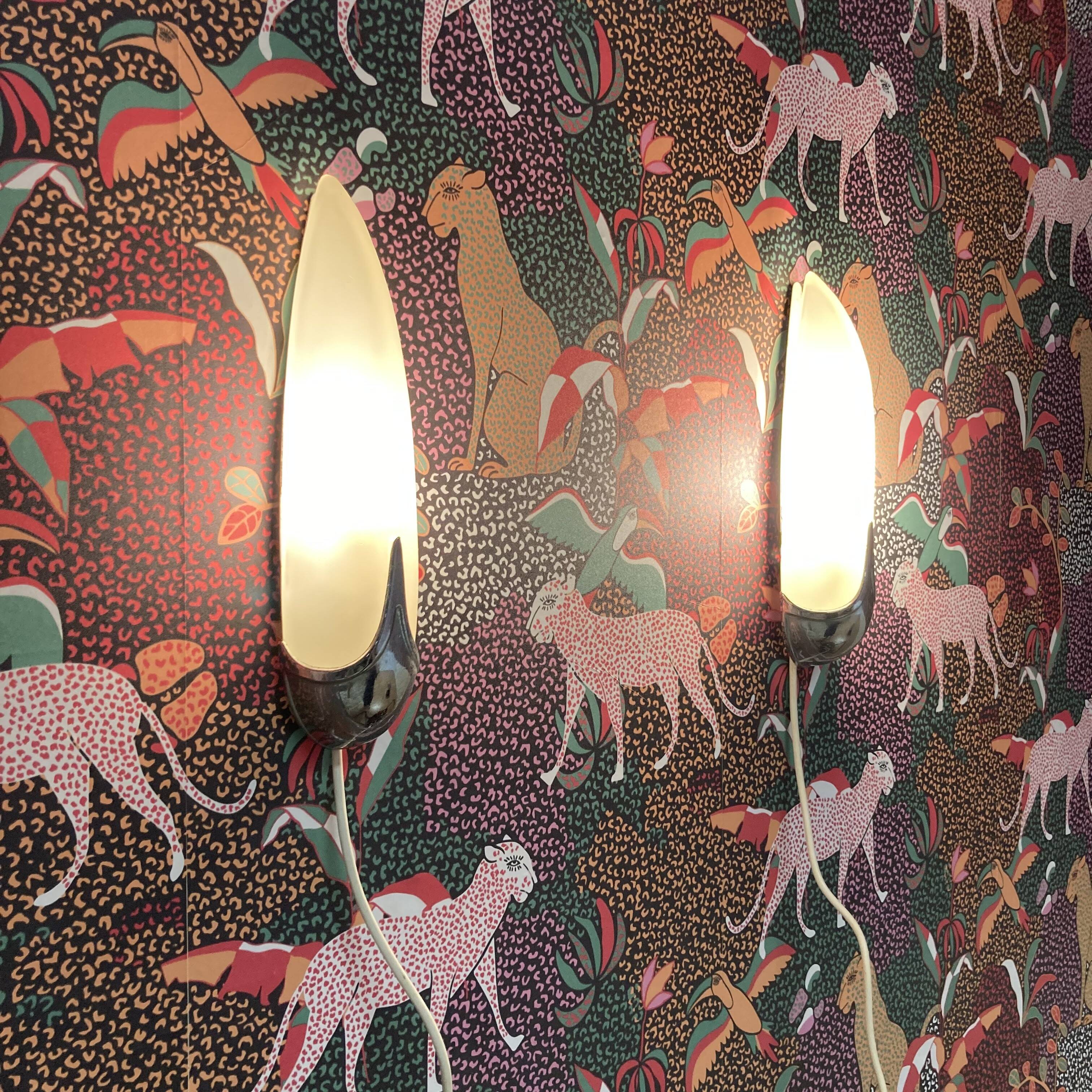 Pair of 1950s designer glass wall lights.