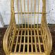 Fauteuil chauffeuse vintage en rotin des années 70