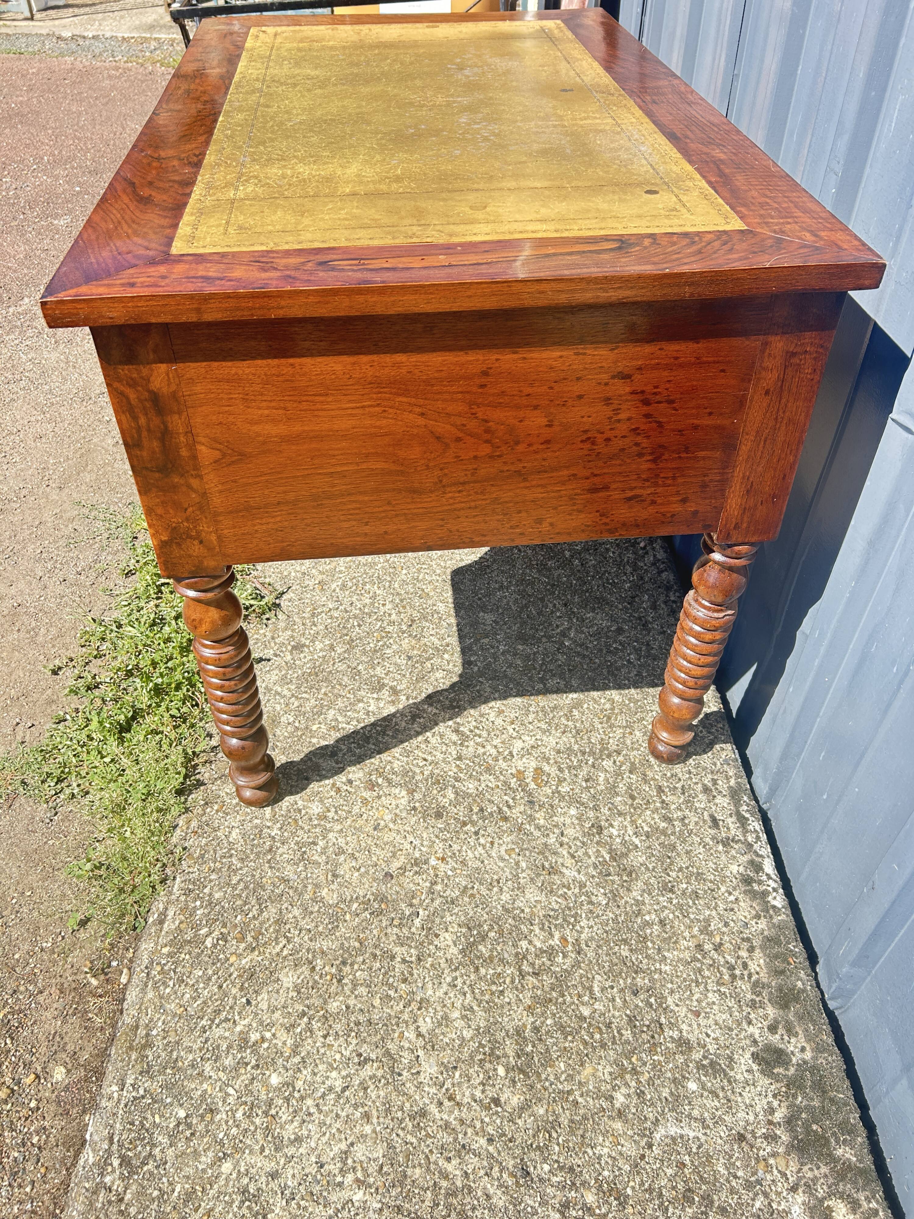 Louis Philippe desk in walnut, with a leather top.