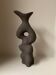 Black stoneware vase in an organic shape