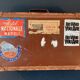 Old travel suitcase and legendary stickers, 1920
