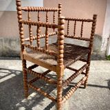 Antique Bobbin armchair with straw seat