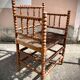 Antique Bobbin armchair with straw seat