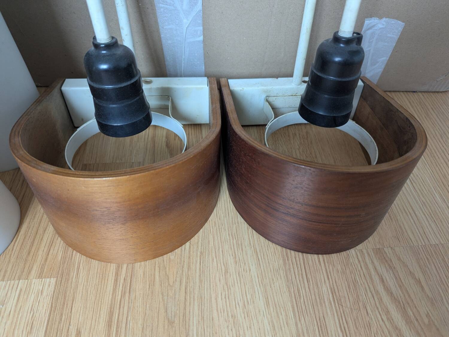 Pair of Louis Kalff NX40 teak and glass wall lights for Philips