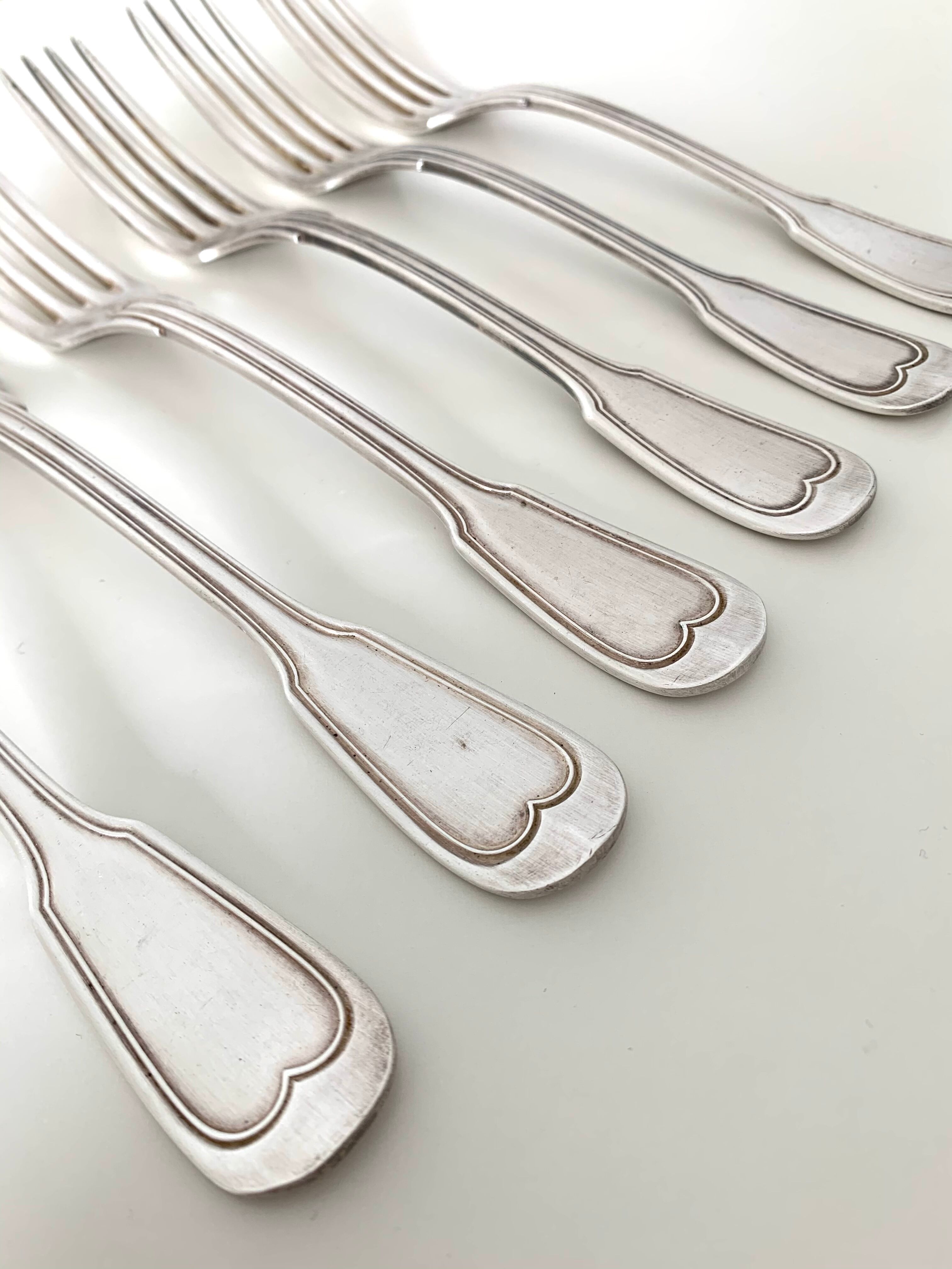 6 silver metal forks
