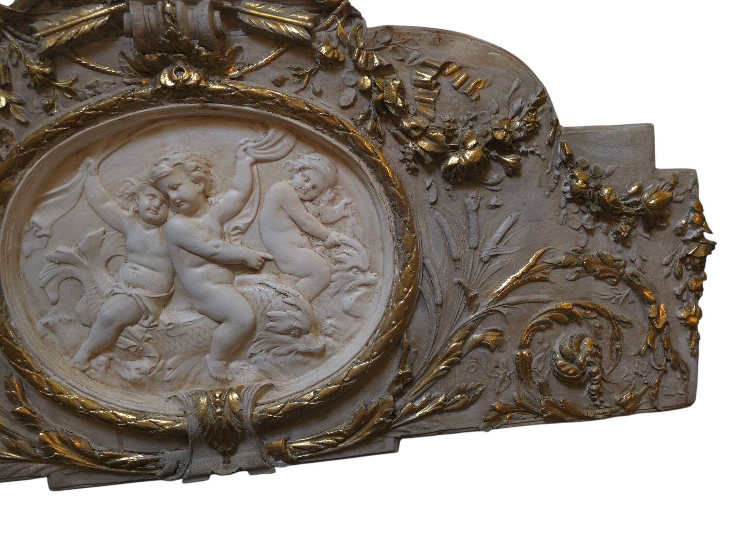 Wall panel with angels in patinated stucco