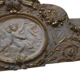 Wall panel with angels in patinated stucco