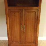Small table and cherry wood sideboard.