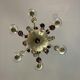 Silver bronze lustre garnished with pampilles, fruits and balls