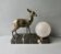 Art Deco lamp with a doe and its original glass globe