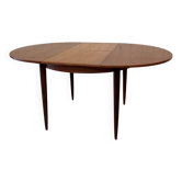 Vintage extendable round teak dining table