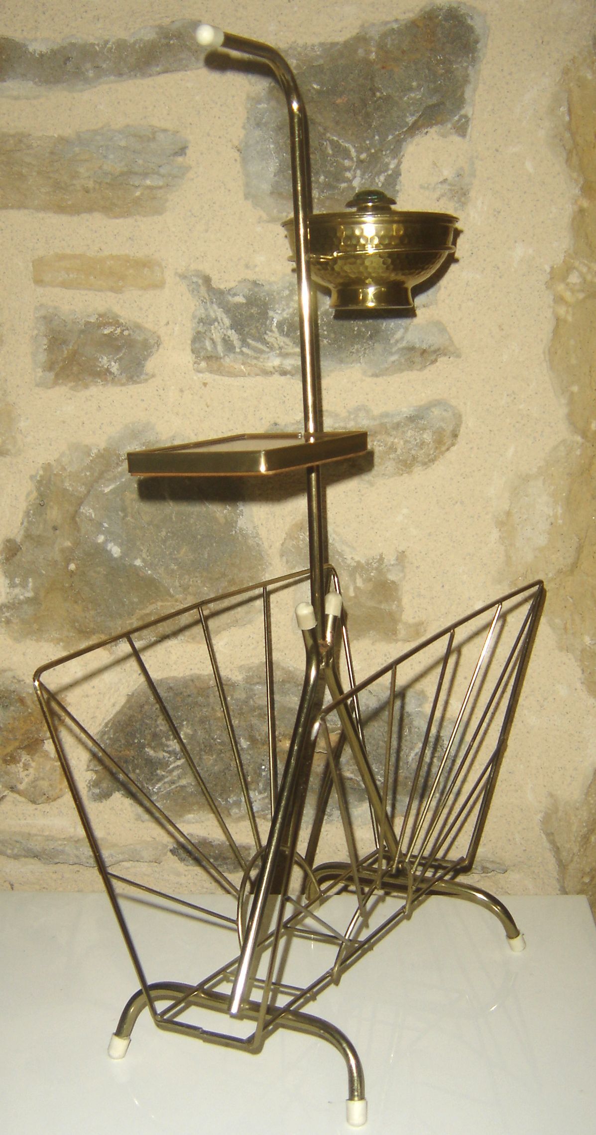 Gilded metal magazine rack and ashtray