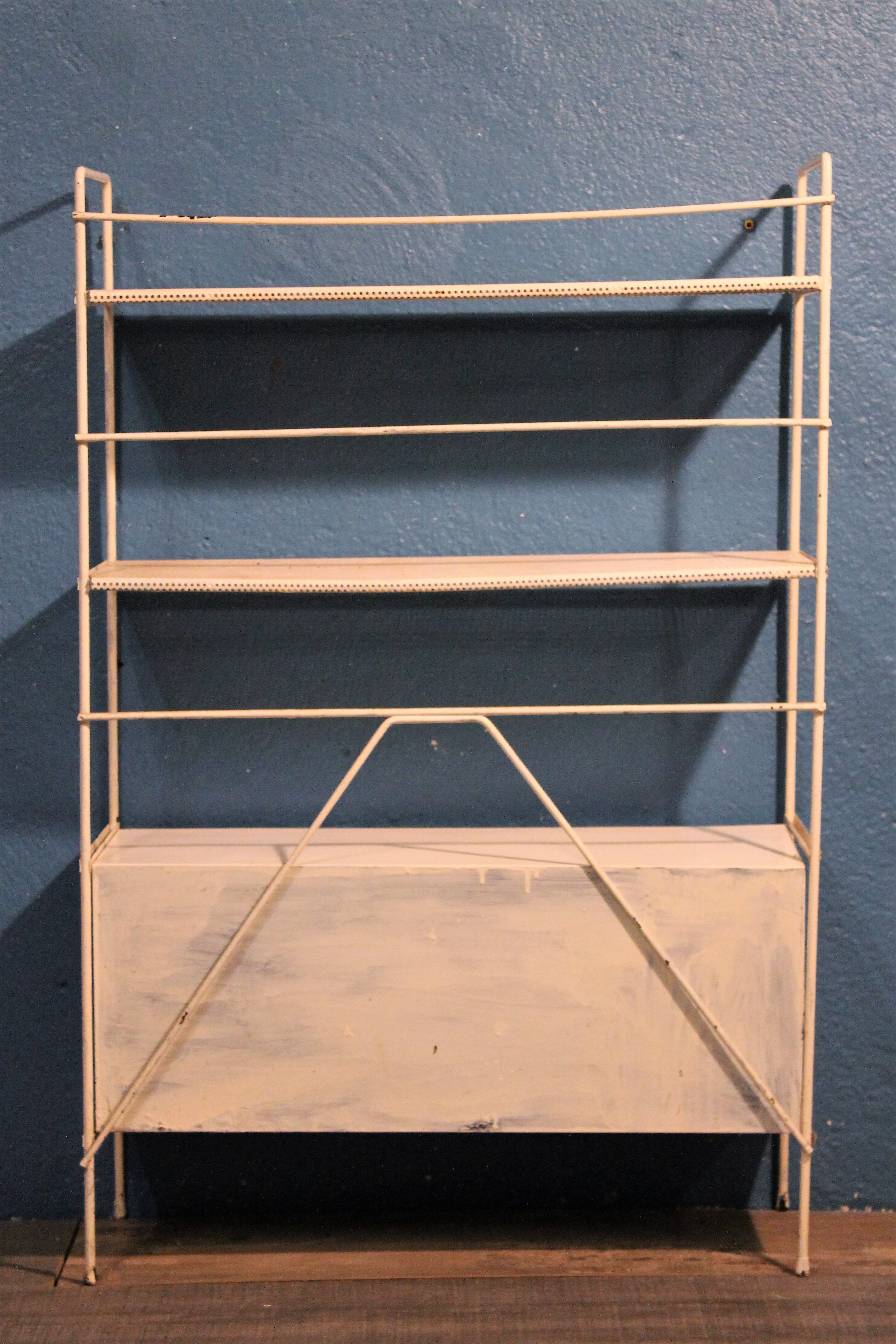 Perforated metal stand 1950