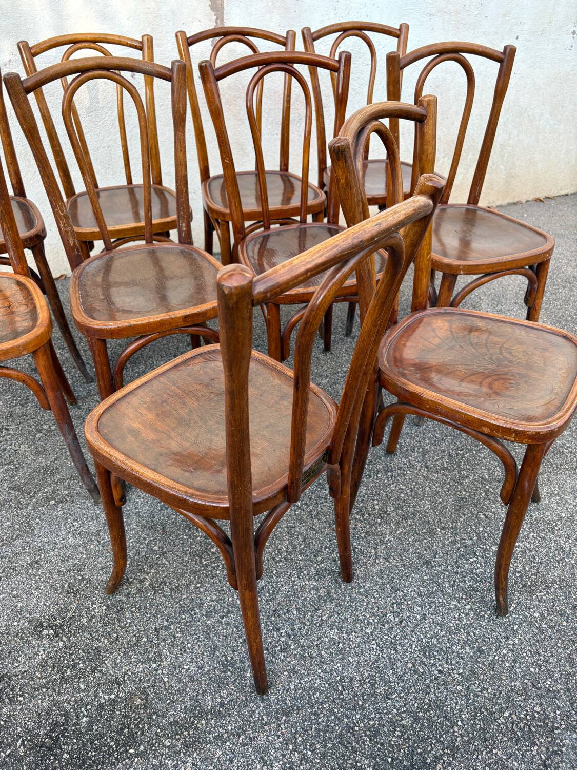 10 varnished patterned bistro chairs