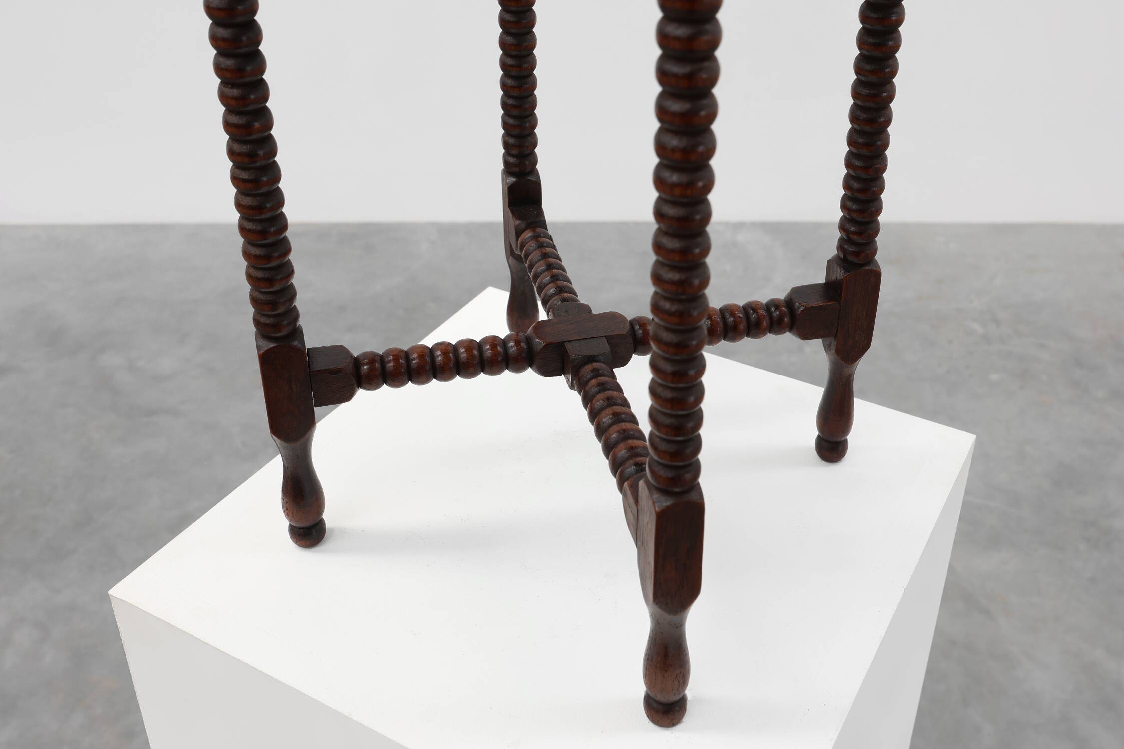 Art Deco round wooden side table with spindle legs, France circa 1900