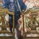Paire de chaises de musiciens en bois sculpté et doré de style Louis XVI