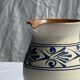 Vintage white pitcher with stylized blue plant frieze H17.5