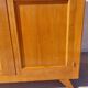 Vintage wardrobe with mirror and tapered legs.