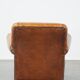 Cognac-colored antique sheep leather armchair