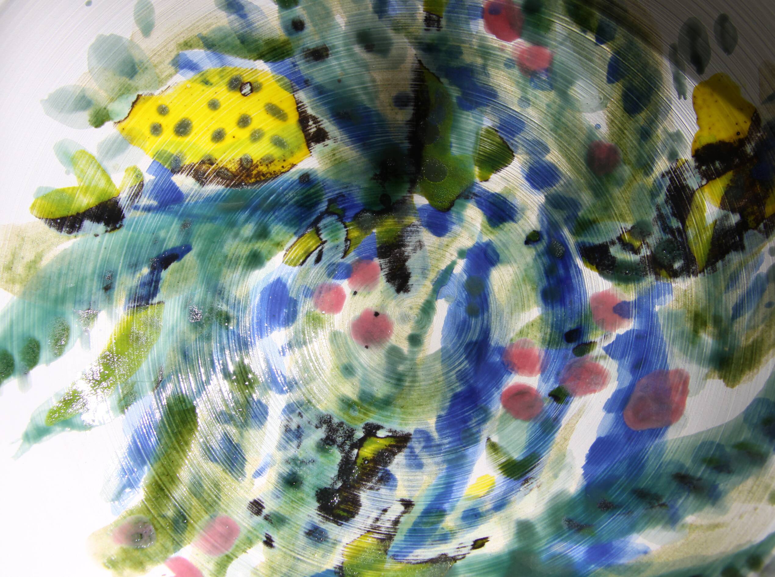 Decorated white earthenware fruit bowl