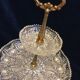 Crystal and bronze cake display