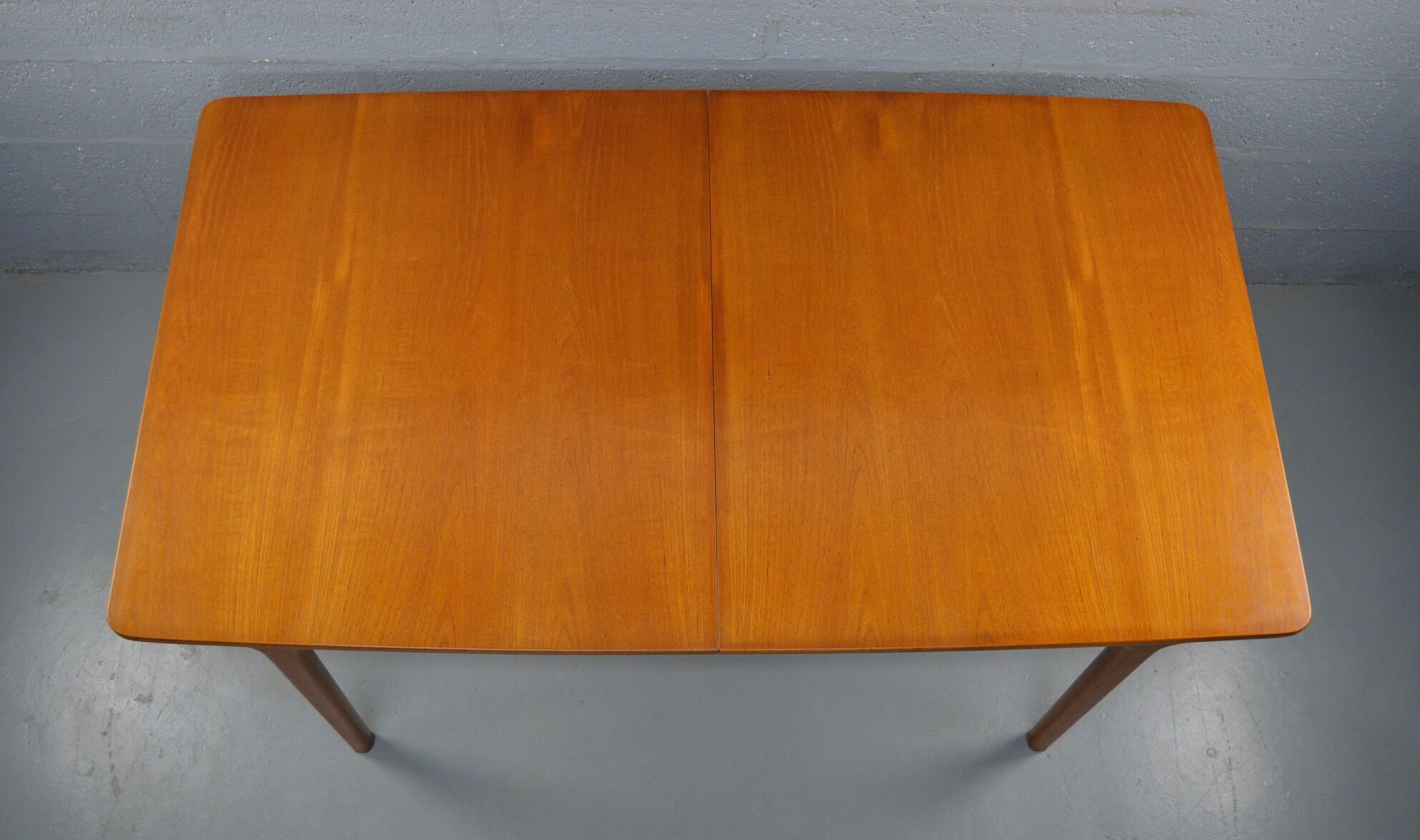 Extendable table by A.H. McIntosh