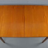 Extendable table by A.H. McIntosh