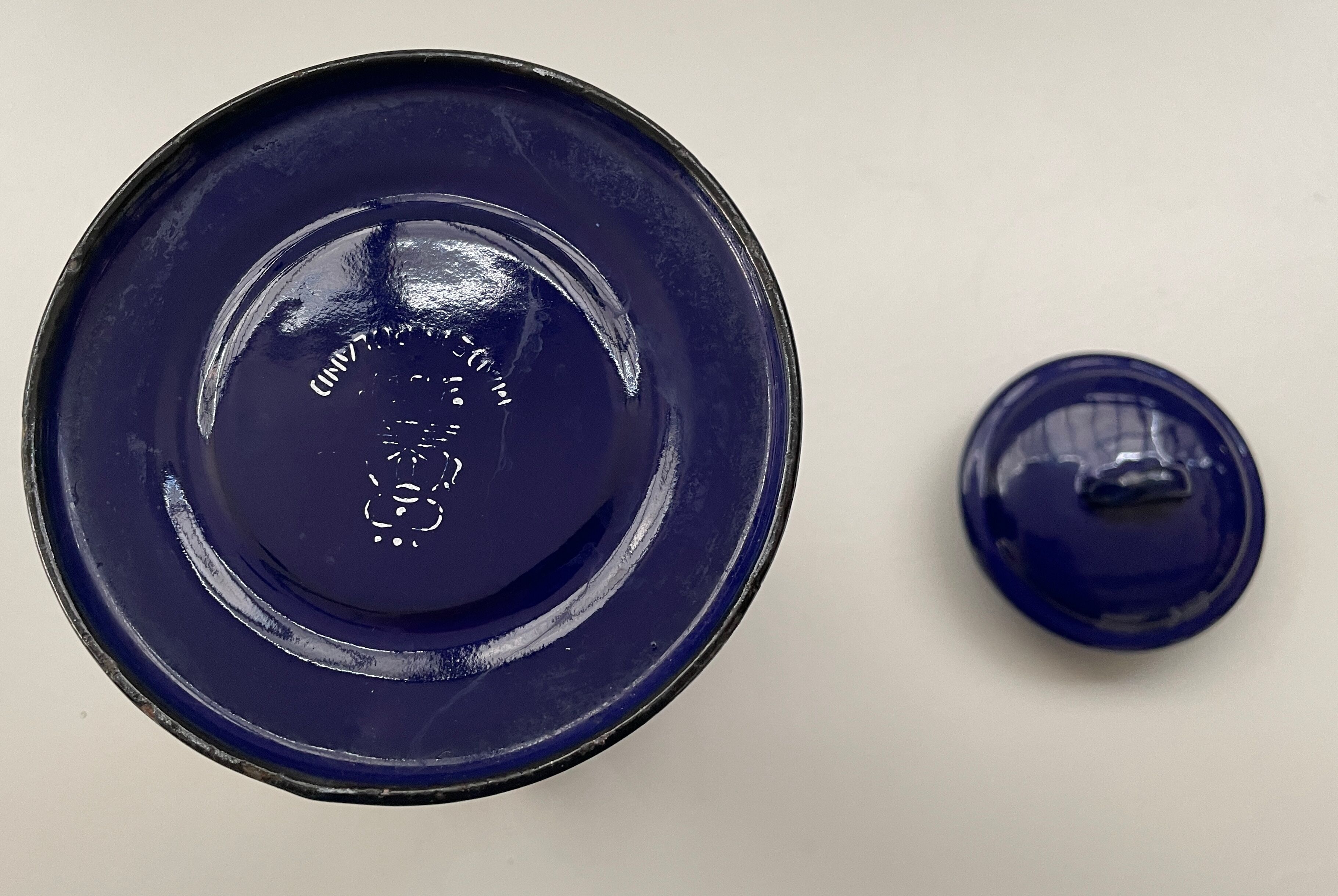 Blue enamelled milk jug