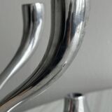 Pair of designer candlesticks in chromed metal
