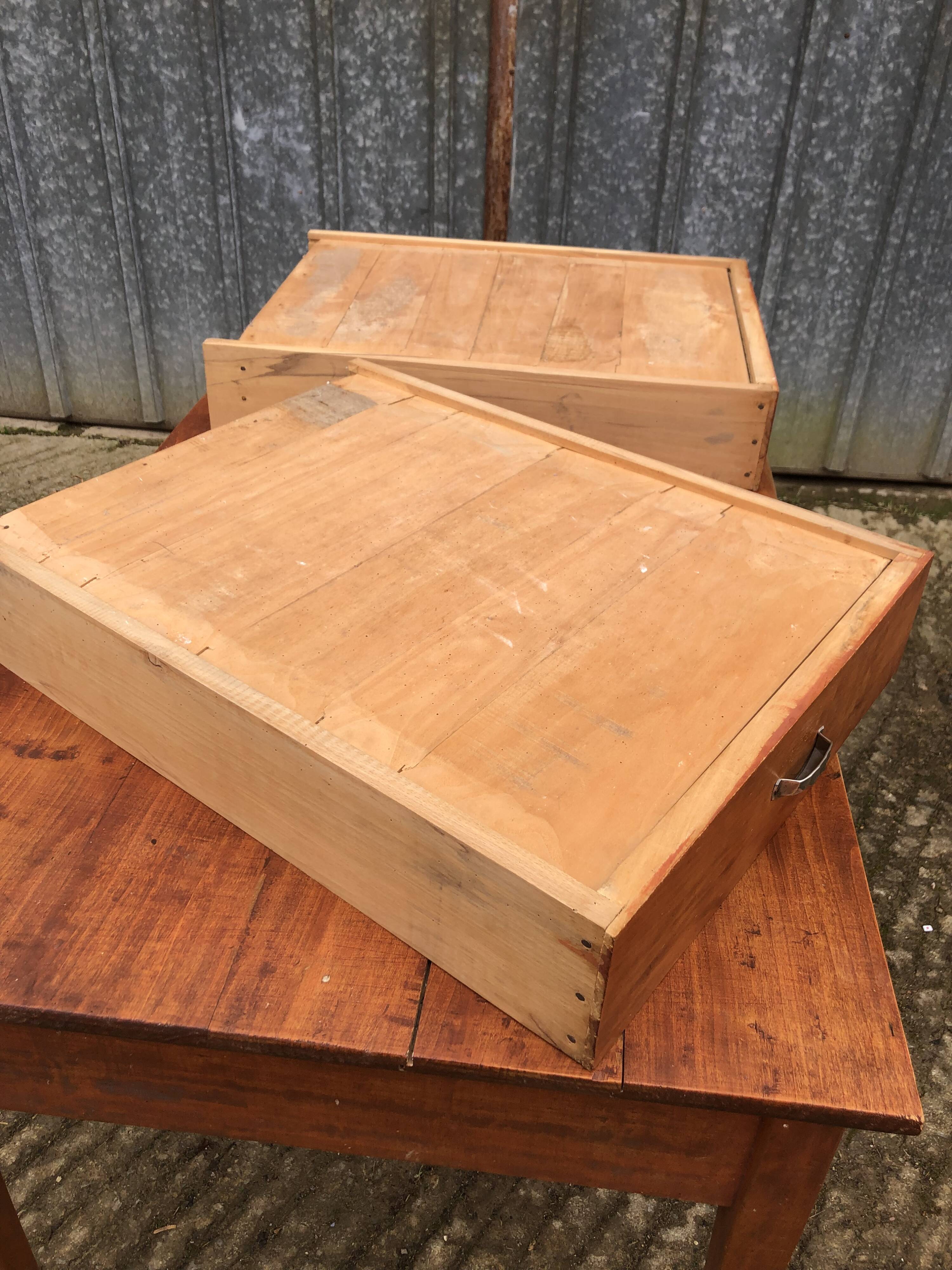 Poplar wood table with 2 front drawers from the Reconstruction period.