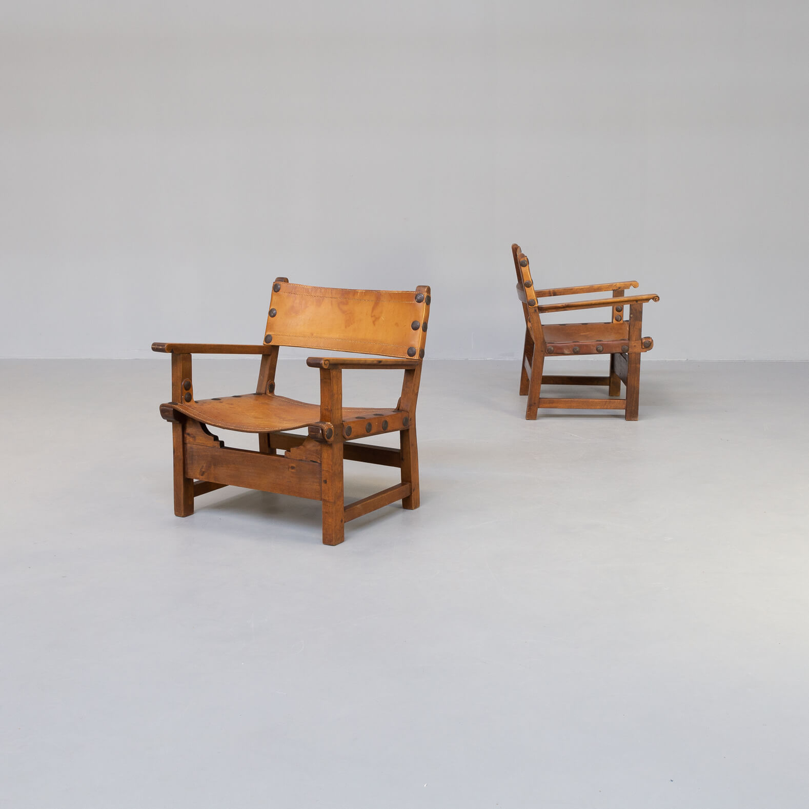 50s oak brutalist spanish chair with saddle leather