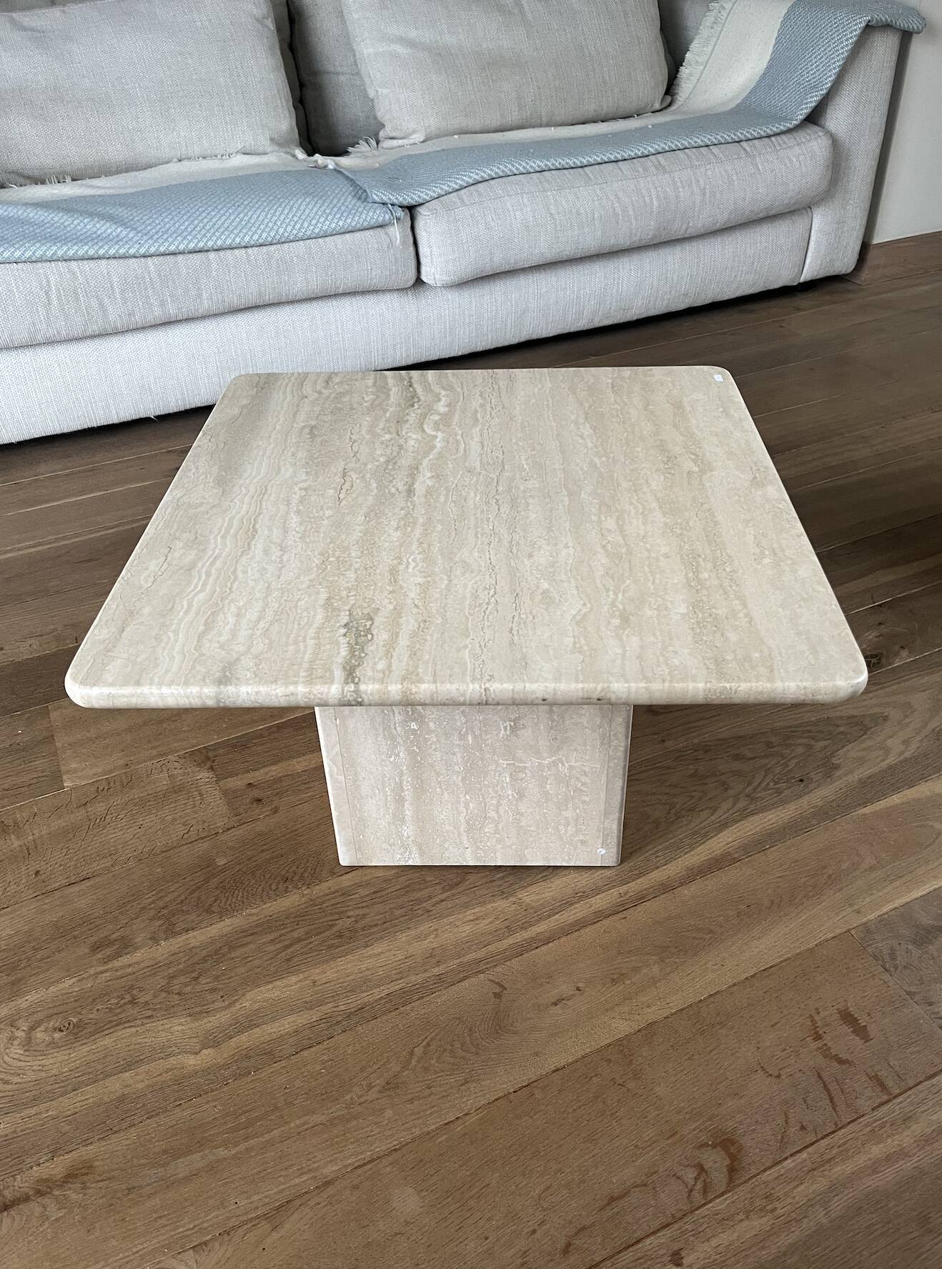 Travertine side table