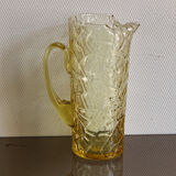Pitcher in crumpled glass