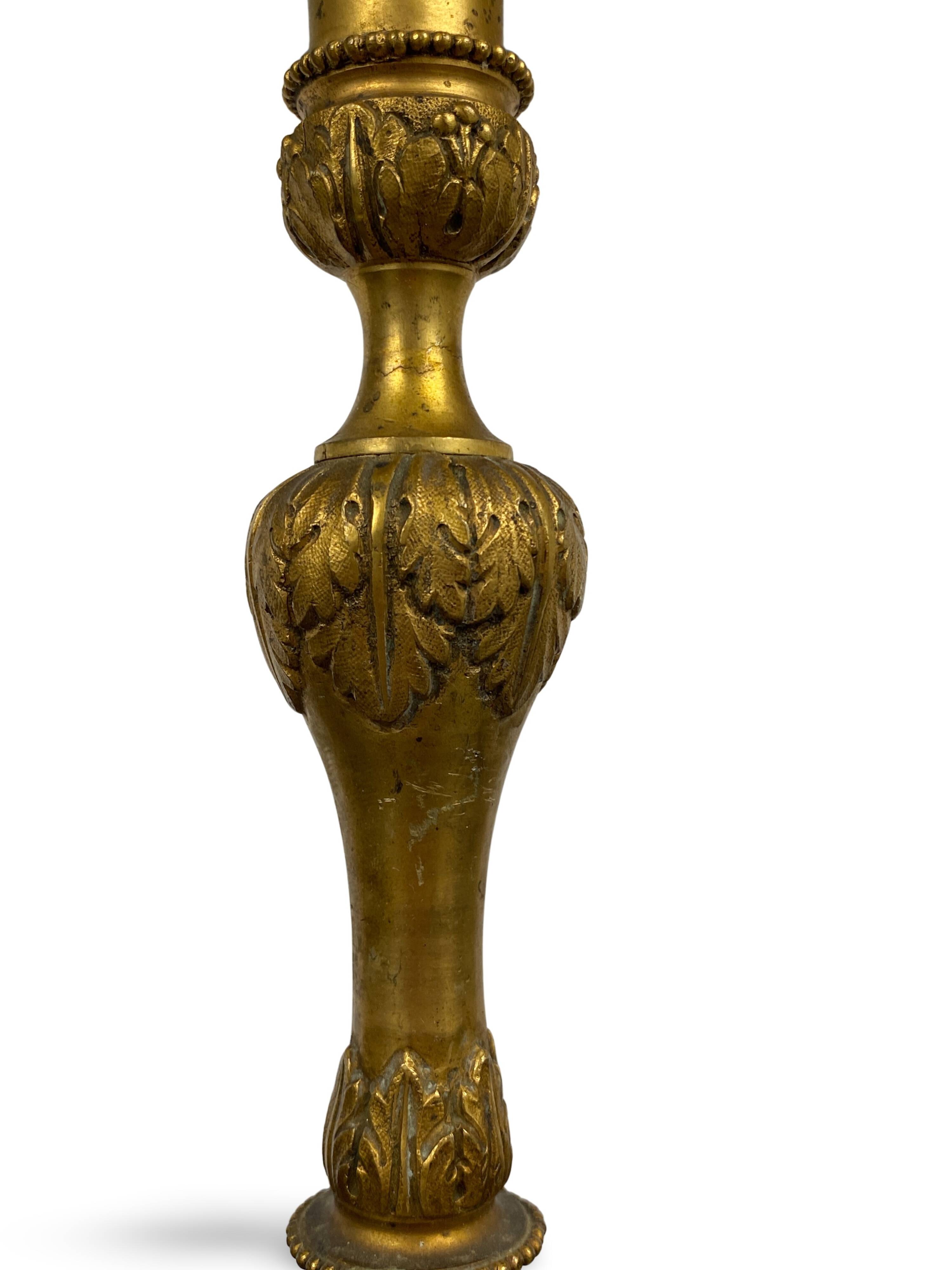 Louis XVI period candlestick in chiseled gilt bronze
