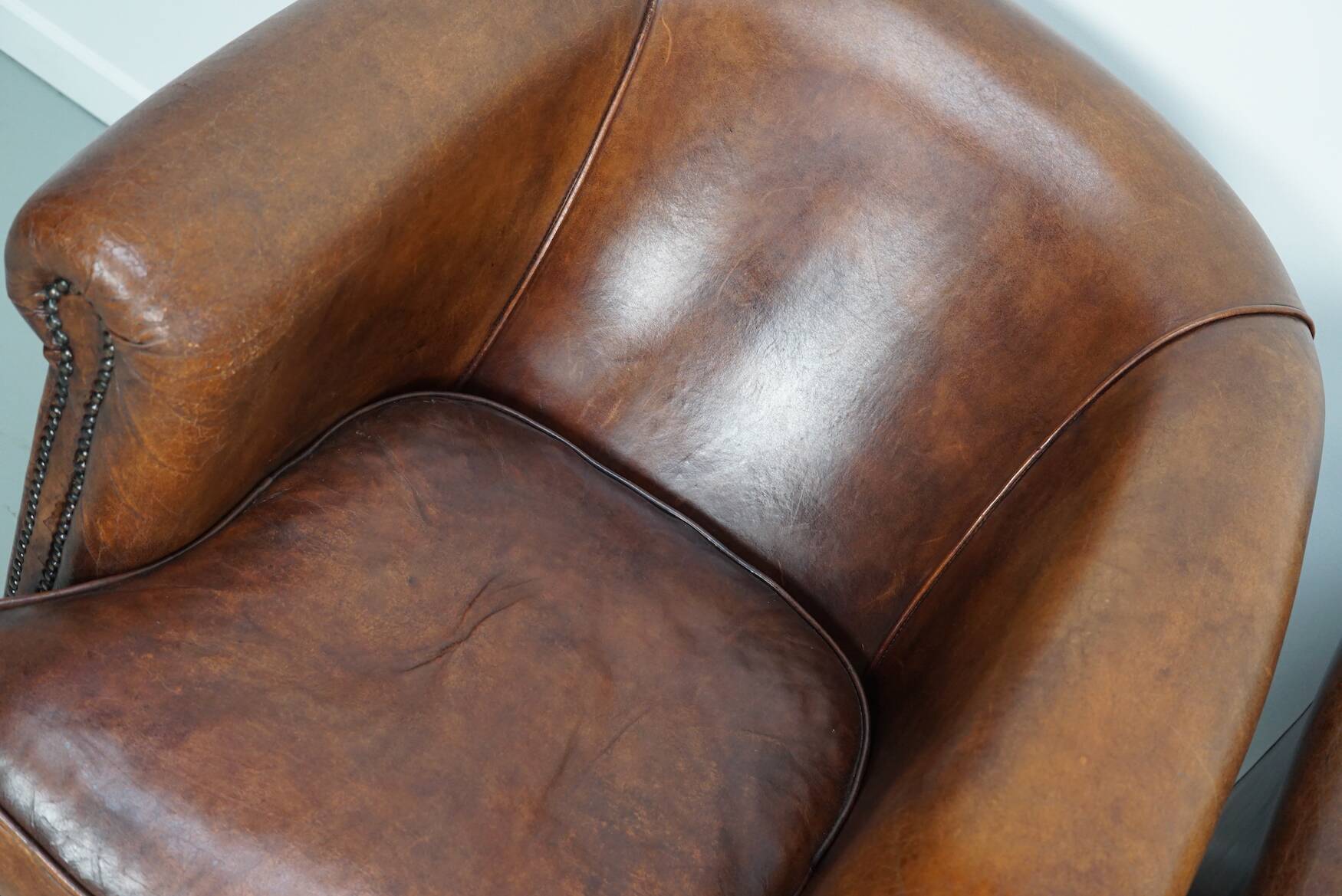 Vintage Dutch cognac coloured leather club chair, set of 2 with footstool