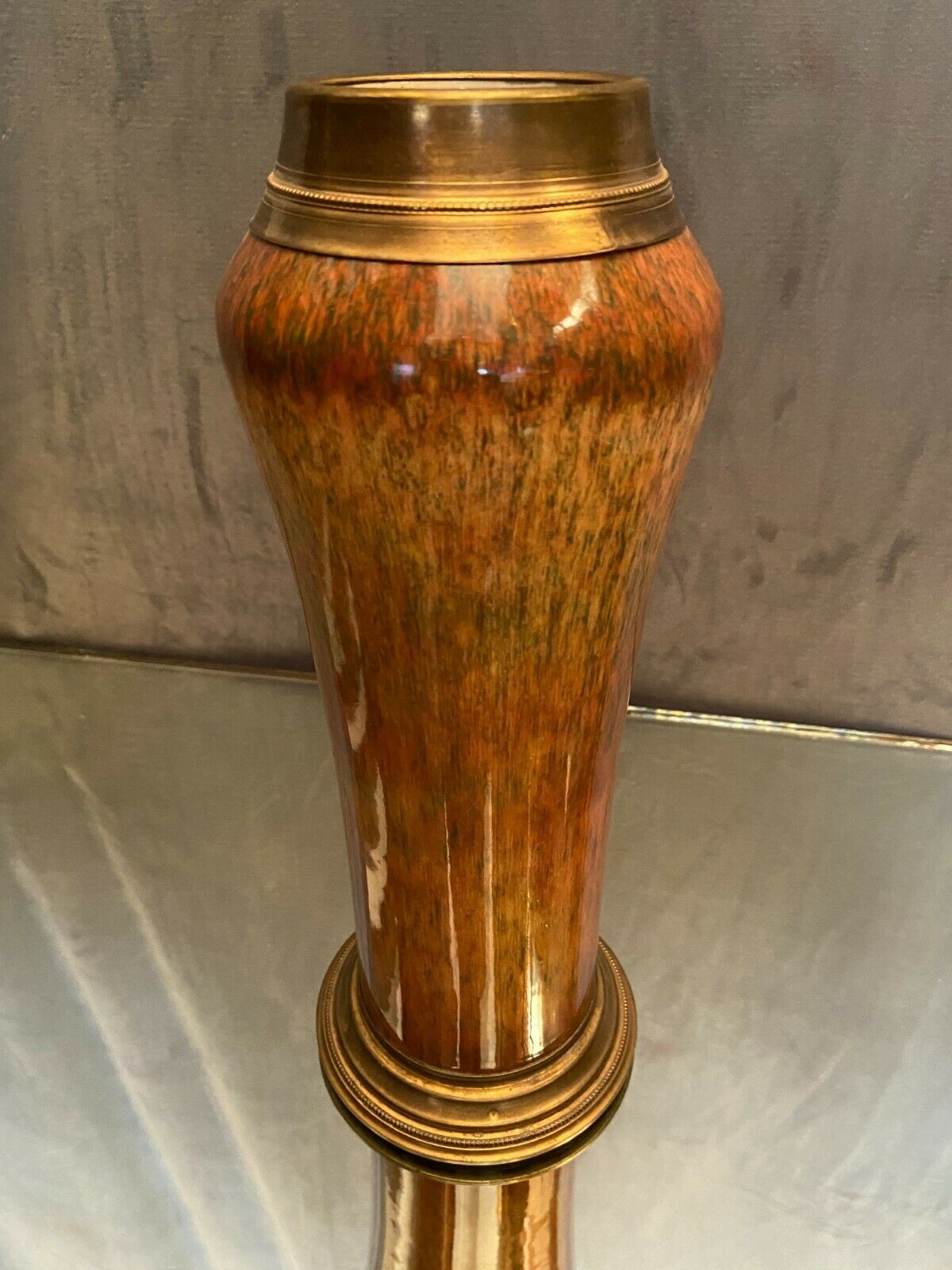 Porcelain vase signed Sèvres on bronze frame